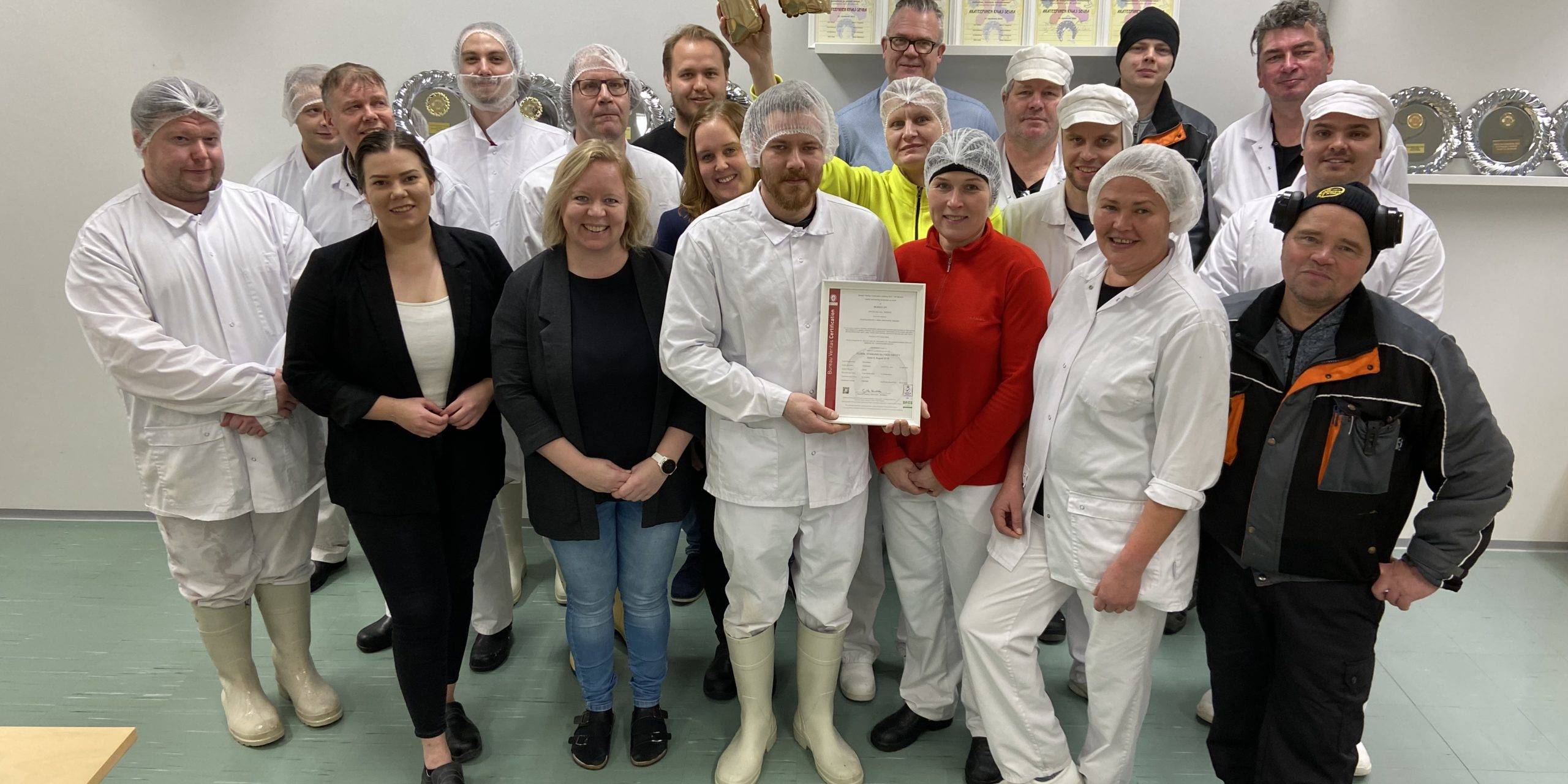 Sausage farmers celebrate BRC certification.